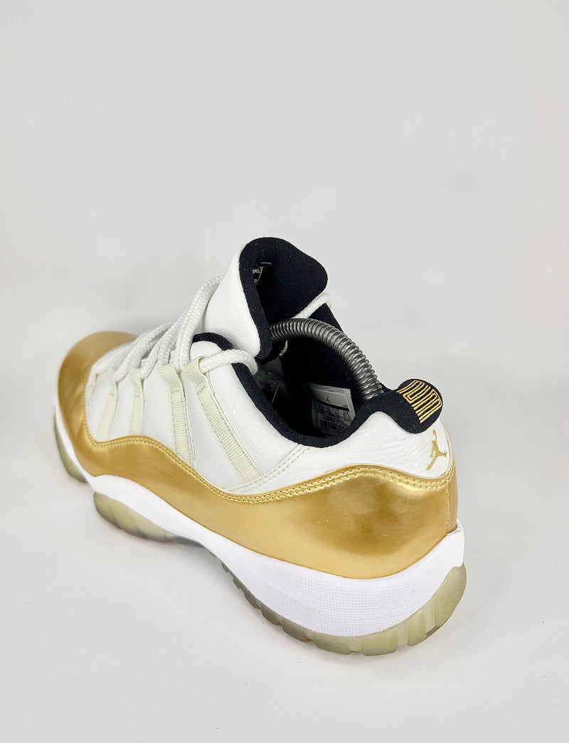 41 - Nike Air Jordan 11 Cerimonial Gold