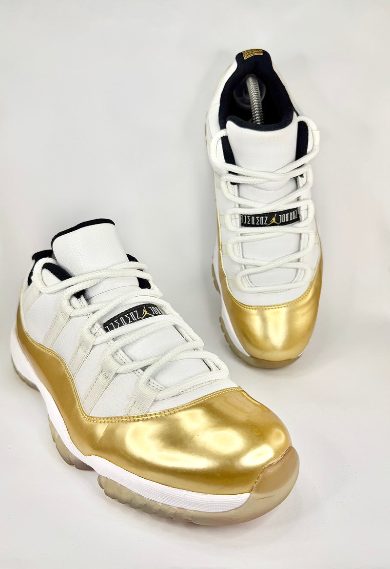 41 - Nike Air Jordan 11 Cerimonial Gold